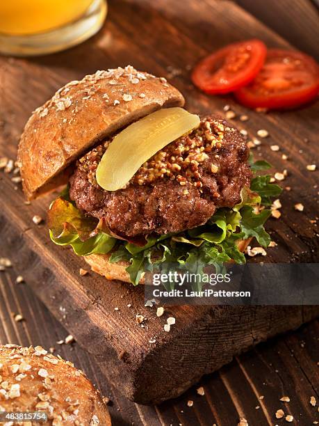 hamburger with micro greens, and a beer - grainy mustard 個照片及圖片檔