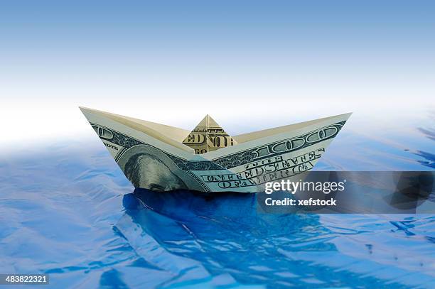 dólar de envío - money boat fotografías e imágenes de stock