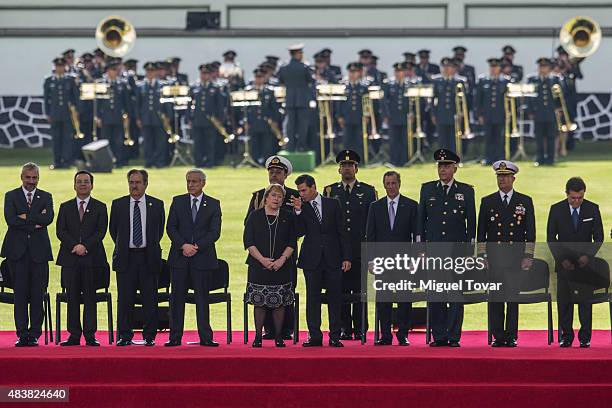 Mexican President Enrique Pea Nieto talks with Michelle Bachelet President of Chile during the welcome ceremony as part of the official visit to...