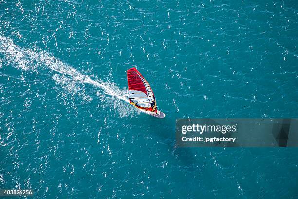 aerial wind surfer on action - windsurfing maui stock pictures, royalty-free photos & images