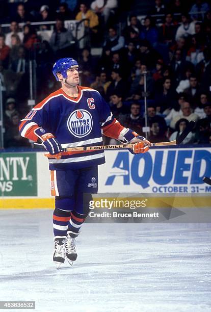 Mark Messier of the Edmonton Oilers skates on the ice during an NHL game against the New York Islanders on January 17, 1991 at the Nassau Coliseum in...