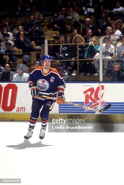 Mark Messier of the Edmonton Oilers skates on the ice during an NHL game against the Los Angeles Kings circa 1990 at the Great Western Forum in...