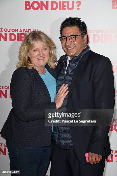 Charlotte de Turckheim and giuest attend the 'Qu'est-ce Qu'on A Fait Au Bon Dieu?' Paris Premiere at Le Grand Rex on April 10, 2014 in Paris, France.