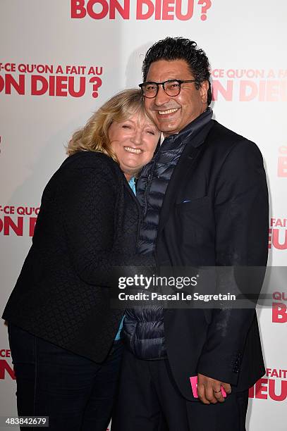 Charlotte de Turckheim and giuest attend the 'Qu'est-ce Qu'on A Fait Au Bon Dieu?' Paris Premiere at Le Grand Rex on April 10, 2014 in Paris, France.