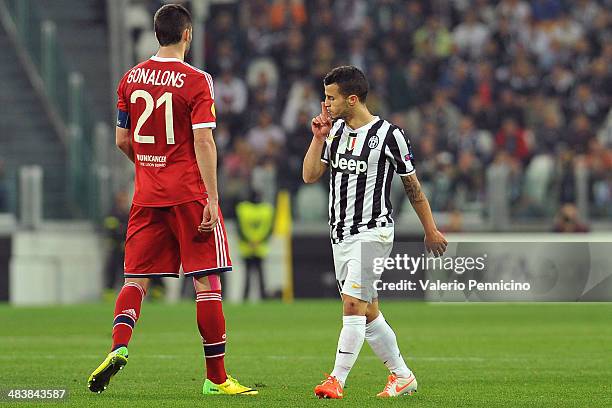 Sebastian Giovinco of Juventus reacts to Maxime Gonalons of Olympique Lyonnais durig the UEFA Europa League quarter final match between Juventus and...