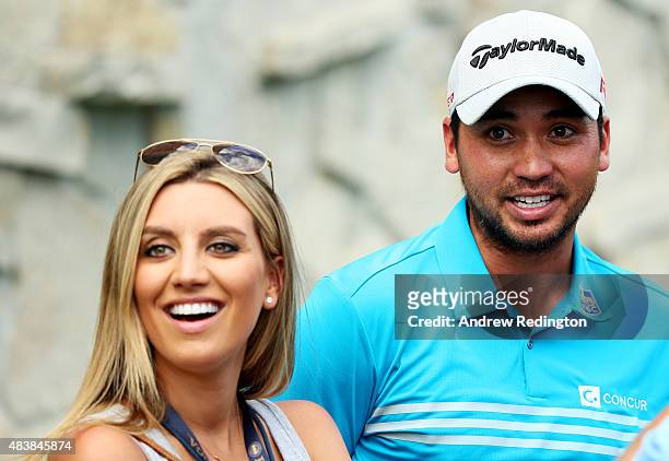 Ellie Day waits near the clubhouse with her husband Jason during the first round of the 2015 PGA Championship at Whistling Straits on August 13, 2015...
