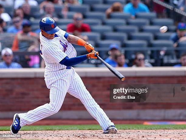 Juan Lagares of the New York Mets hits a three run homer in the eighth innning against the Colorado Rockies on August 13, 2015 at Citi Field in the...