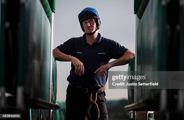 Race officials await the last race at Lingfield Park on August 13, 2015 in Lingfield, England.