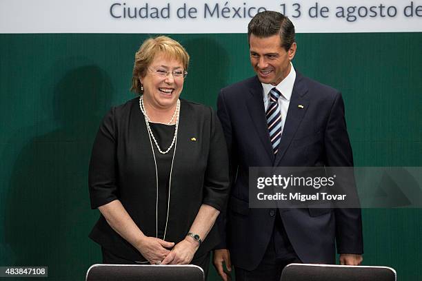 Mexican President Enrique Peña Nieto and Michelle Bachelet, President of Chile, talk during an official visit to Mexico at Los Pinos official...