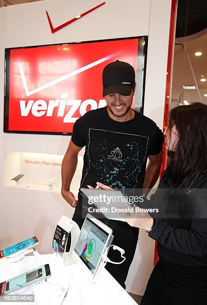 Country music star Luke Bryan was at the Grand Opening of Verizon Wireless' new SMART Store in Herald Square to pre-order the latest Samsung Galaxy...