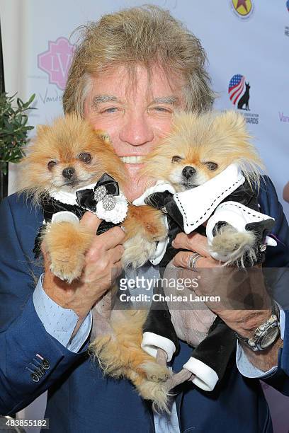 Personalities Ken Todd, Giggy the Pomeranian and Giggy's father arrive at a luncheon hosted by Lisa Vanderpump benefiting The American Humane...