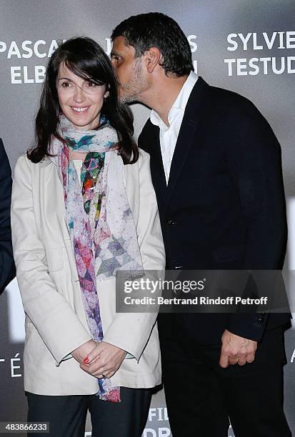 Actors of the movie Zabou Breitman and Pascal Elbe attend the '24 Jours' Paris Premiere at Cinema Gaumont Marignan on April 10, 2014 in Paris, France.