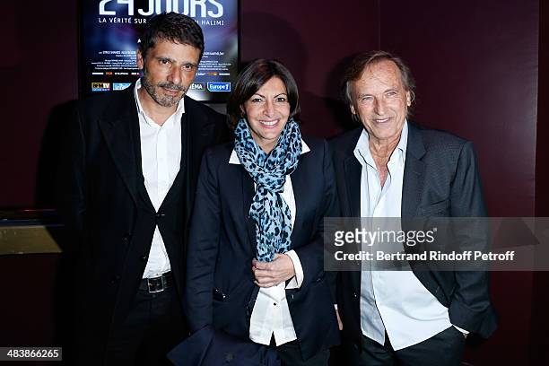 Actor of the movie Pascal Elben Mayor of Paris Anne Hidalgo and director of the movie Alexandre Arcady attend the '24 Jours' Paris Premiere at Cinema...