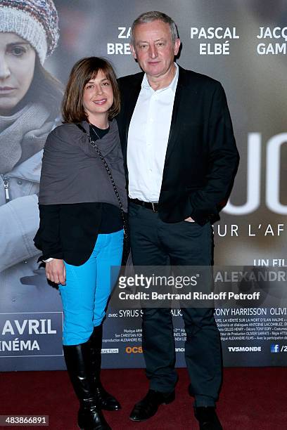 Writer Yann Queffelec and his wife Servanne attend the '24 Jours' Paris Premiere at Cinema Gaumont Marignan on April 10, 2014 in Paris, France.