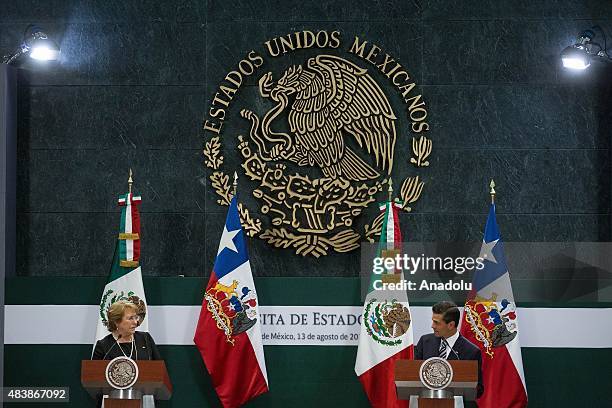 Michelle Bachelet President of Chile and Enrique Pena Nieto President of Mexico attend a press conference at the Official Residence of Los Pinos in...