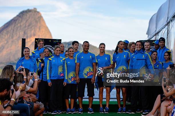 Branca Feres, Bia Feres, Juliano Belletti, Cafu, Fernanda Lima, Lais Ribeiro and the volunteers pose for photo on the runway of Volunteers Uniform...