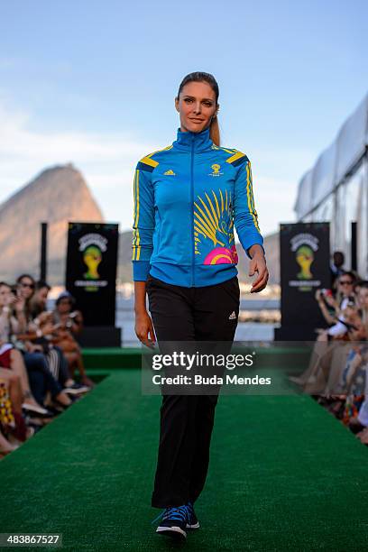 Brazilian TV presenter and model Fernanda Lima walks the runway of Volunteers Uniform Launch - 2014 FIFA World Cup Brazil during Fashion Rio Summer...