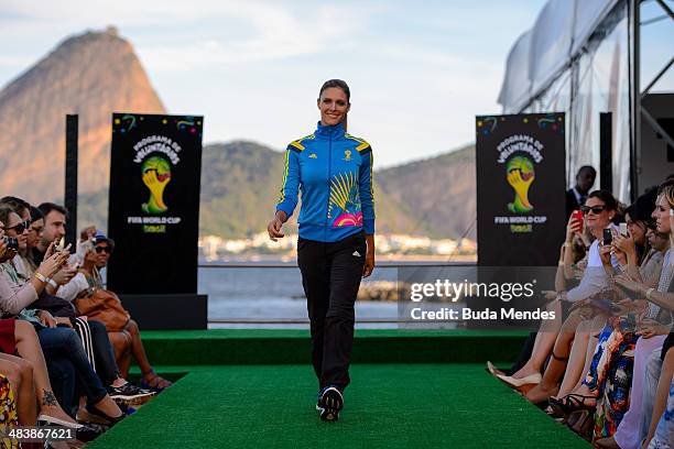 Brazilian TV presenter and model Fernanda Lima walks the runway of Volunteers Uniform Launch - 2014 FIFA World Cup Brazil during Fashion Rio Summer...