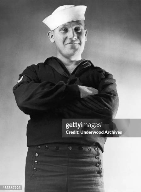 United States Navy enlisted man in his uniform which has thirteen buttons on his trousers, one for each of the original states, mid to late 1920s.