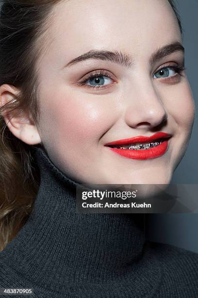 teenage girl with red lip stick and braces. - red lipstick stick stock pictures, royalty-free photos & images