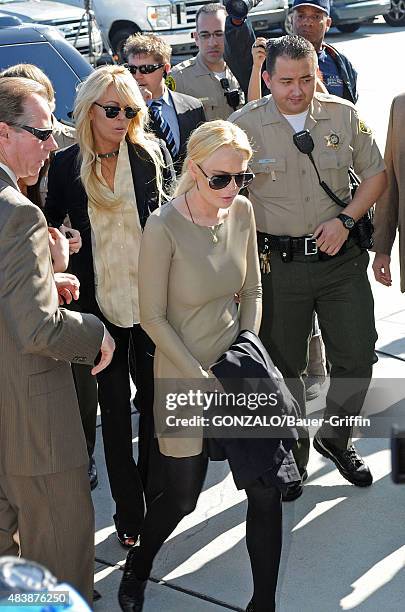 Lindsay Lohan is seen arriving at Los Angeles County Superior Court with her mother Dina on March 10, 2011 in Los Angeles, California.