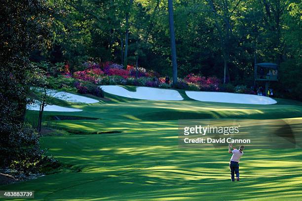 Russell Henley of the United States hits a shot on the 13th during the first round of the 2014 Masters Tournament at Augusta National Golf Club on...