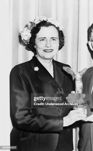 Portrait of philanthropist and health activist Mary Lasker presenting an award, 1957. She was co-founder of the medical research oriented Lasker...