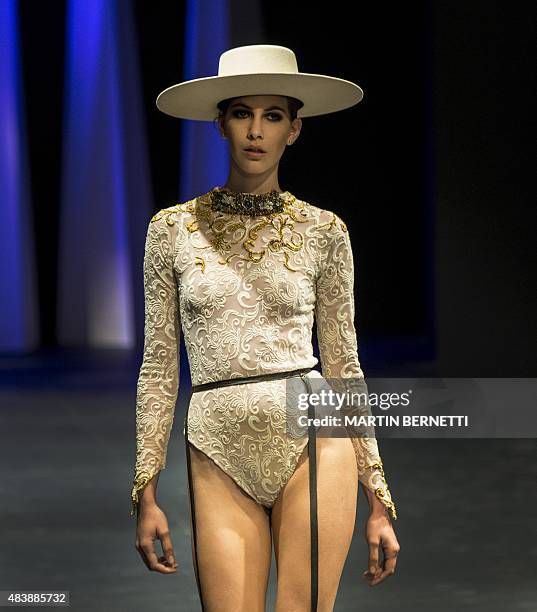 Model presents a creation by Lupe Gajardo during the 2015 spring-summer collection of the Mercedes Benz Fashion Week in Santiago, Chile, on August...