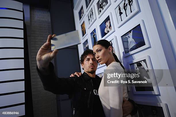 Fashion photographer Steven Klein and model Bella Hadid attend the launch of Samsung's fall Lookbook in celebration of the new Samsung Galaxy S6...