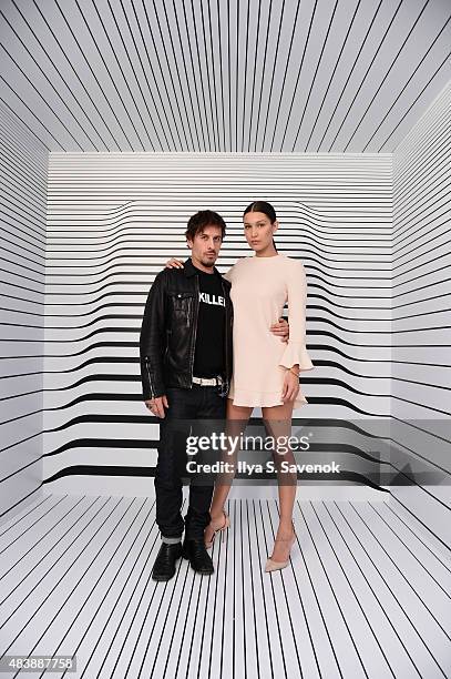 Fashion photographer Steven Klein and model Bella Hadid attend the launch of Samsungs fall Lookbook in celebration of the new Samsung Galaxy S6 edge+...