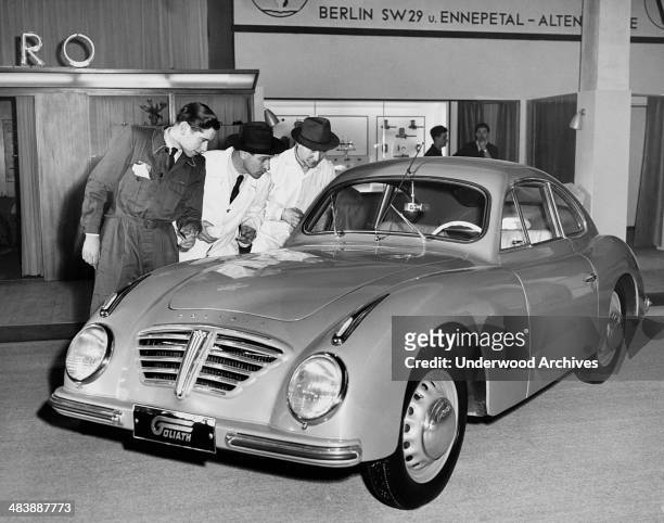 One of the big attractions at Frankfurt's 36th International Auto Show is the German Goliath sports coupe, Frankfurt, Germany, March 23, 1953. It has...