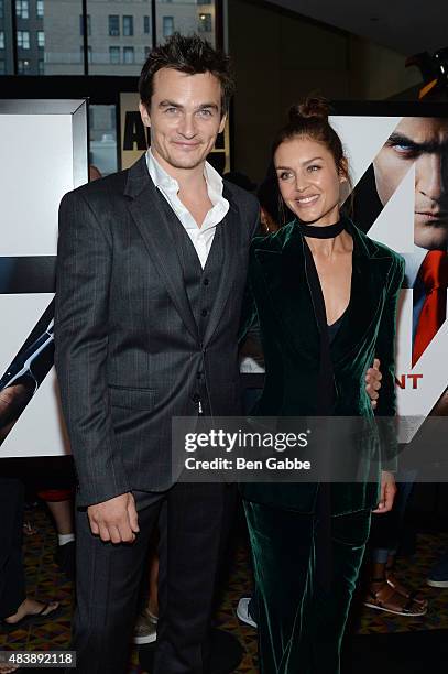 Actors Rupert Friend and Hannah Ware attend the New York premiere of "Hitman Agent 47" at AMC Empire 25 theater on August 13, 2015 in New York City.