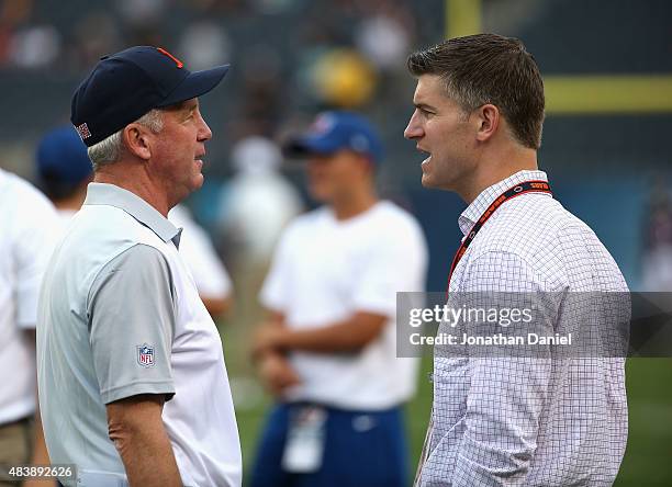 Head coach John Fox and general manager Ryan Pace of the Chicago Bears chat before warm-ups before a preseason game against the Miami Dolphins game...