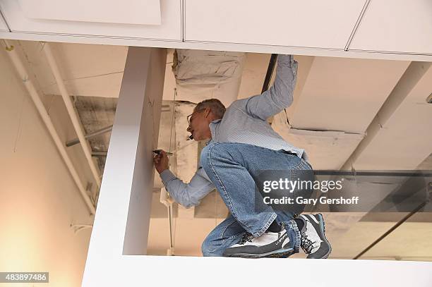 Writer/mountaineer Jon Krakauer signs his signature at AOL Build Presents: "MERU" at AOL Studios In New York on August 13, 2015 in New York City.