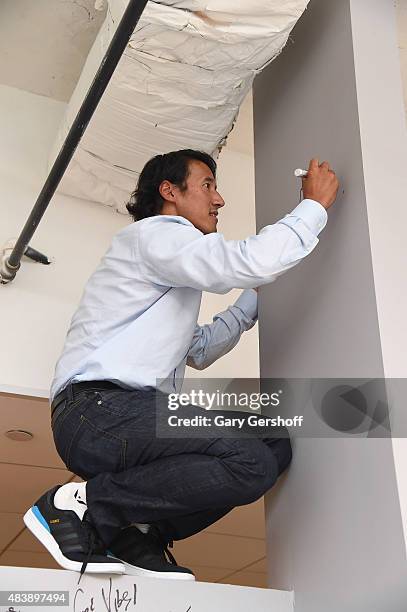 Filmmaker and mountaineer Jimmy Chin seen drawing at AOL Build Presents: "MERU"at AOL Studios In New York on August 13, 2015 in New York City.