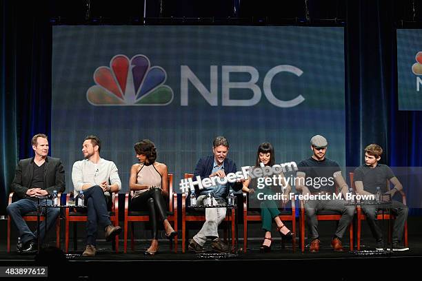 Actors Jack Coleman, Zachary Levi, Judi Shekoni, executive producer Tim Kring, actors Kiki Sukezane, Ryan Guzman and Robbie Kay speak onstage during...