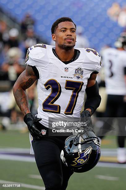 Asa Jackson of the Baltimore Ravens warms up before the start of the Ravens preseason game against the New Orleans Saints at M&T Bank Stadium on...