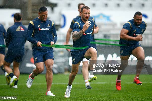 Quade Cooper of the Wallabies warms up during the Australian Wallabies Captain's Run at Eden Park on August 14, 2015 in Auckland, New Zealand.