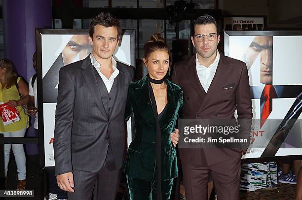 Actors Rupert Friend, Hannah Ware and Zachary Quinto attend the "Hitman Agent 47" New York premiere at AMC Empire 25 theater on August 13, 2015 in...