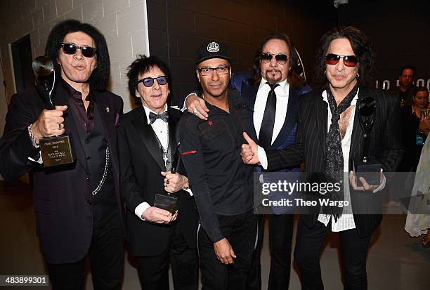 Inductees Paul Stanley, Peter Criss, Ace Frehley and Gene Simmons of KISS pose with musician Tom Morello at the 29th Annual Rock And Roll Hall Of...