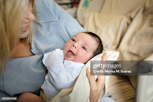 Billy Joel and Alexis Joel's new baby daughter, Della Rose Joel, photographed in her mother's arms on August 12, 2015 in New York.