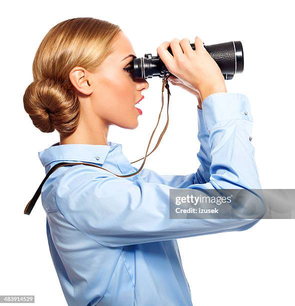 businesswoman with binoculars - women wearing see through clothing stockfoto's en -beelden