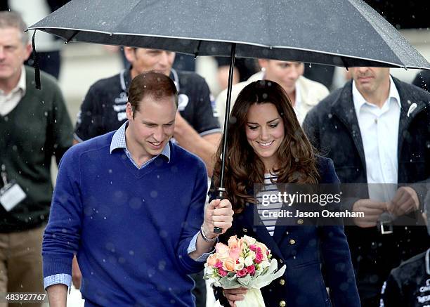 Prince William, Duke of Cambridge and Catherine, Duchess of Cambridge arrive in the rain at the Viaduct Basin in Auckland on April 11, 2014 in...