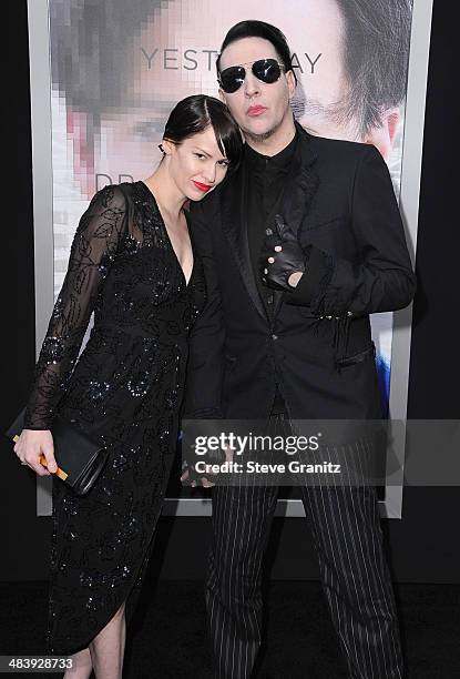 Lindsay Usich and musician Marilyn Manson attend the premiere of "Transcendence" at Regency Village Theatre on April 10, 2014 in Westwood, California.