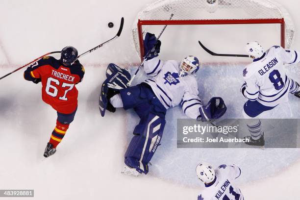 Vincent Trocheck of the Florida Panthers skates after the puck after Goaltender Drew MacIntyre of the Toronto Maple Leafs makes a save in the second...