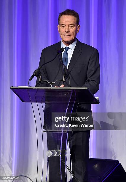 Actor Bryan Cranston accepts grant on behalf of LACC onstage during HFPA Annual Grants Banquet at the Beverly Wilshire Four Seasons Hotel on August...