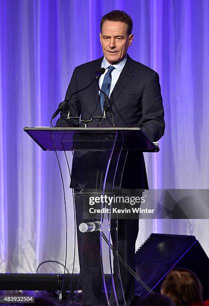 Actor Bryan Cranston accepts grant on behalf of LACC onstage during HFPA Annual Grants Banquet at the Beverly Wilshire Four Seasons Hotel on August...