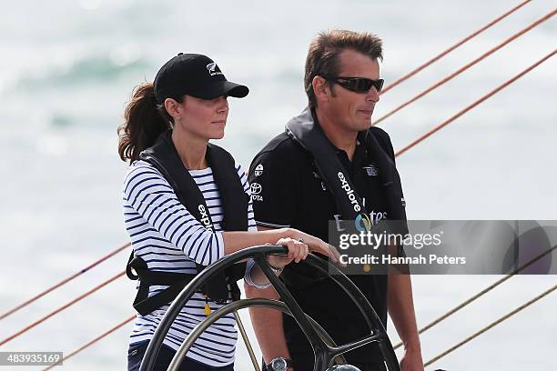 Catherine, Duchess of Cambridge races with Team New Zealand skipper Dean Barker during a match race on the Waitemata Harbour on April 11, 2014 in...