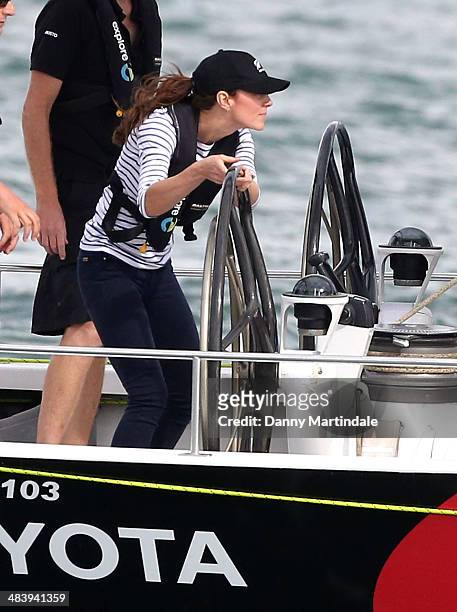 Catherine, Duchess of Cambridge is seen racing the New Zealand's Americas Cup Team yacht during their visit to Auckland Harbour on April 11, 2014 in...