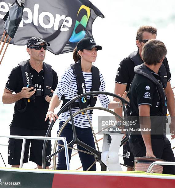 Catherine, Duchess of Cambridge is seen racing the New Zealand's Americas Cup Team yacht during their visit to Auckland Harbour on April 11, 2014 in...